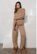 Бежевый вязаный костюм с разрезами. Maritel Бежевый вязаный костюм с разрезами. Maritel