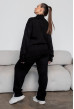 Чорний в'язаний костюм з розрізами —  715474. Maritel. Зображення 1 Чорний в'язаний костюм з розрізами —  715474. Maritel. Зображення 1
