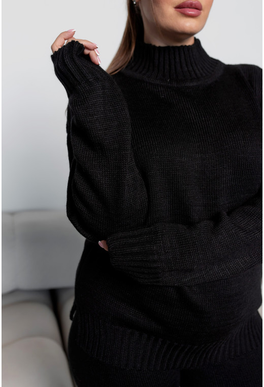 Чорний в'язаний костюм з розрізами —  715474. Maritel. Зображення 3 Чорний в'язаний костюм з розрізами —  715474. Maritel. Зображення 3