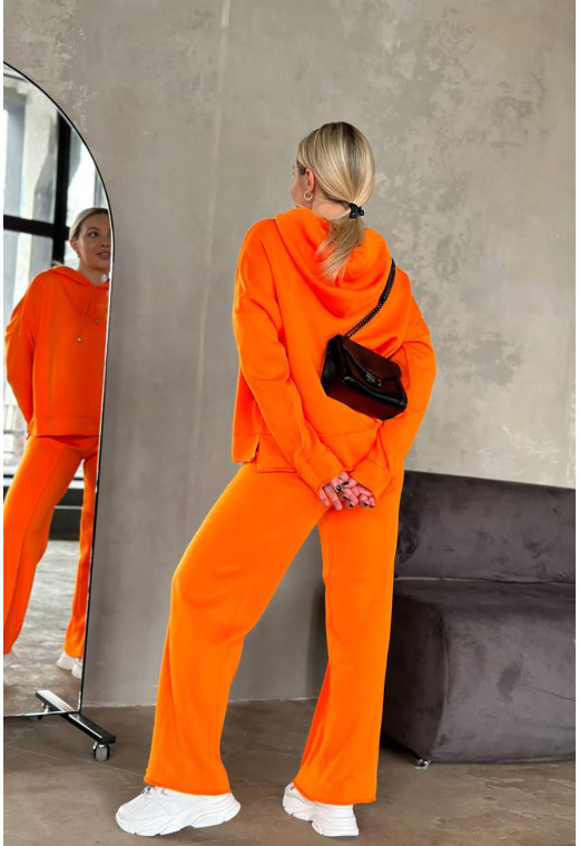 Помаранчевий костюм відстрочка з капюшоном — 863760. Maritel. Зображення 1 Помаранчевий костюм відстрочка з капюшоном — 863760. Maritel. Зображення 1