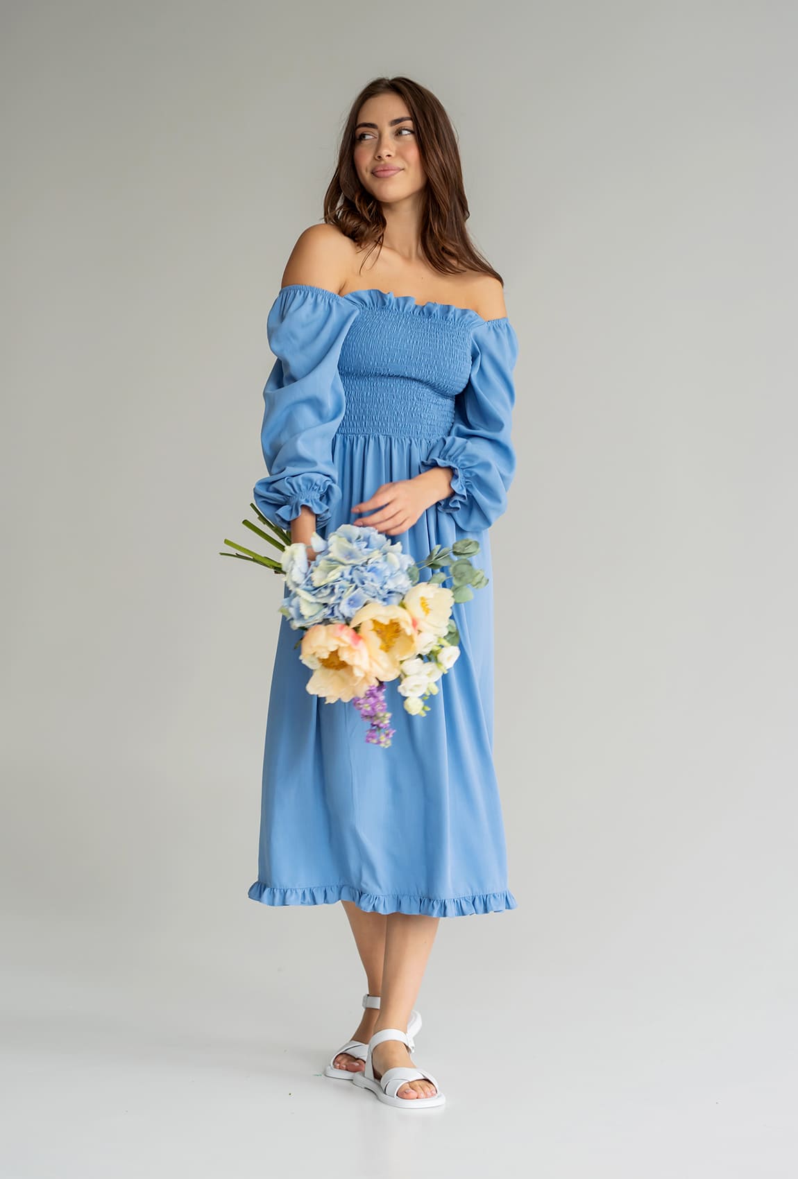 Голубое вязаное платье резинка —  588854. Maritel Голубое вязаное платье резинка —  588854. Maritel