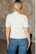 Молочна футболка поло косичка — 860683. Maritel. Зображення 1 Молочна футболка поло косичка — 860683. Maritel. Зображення 1