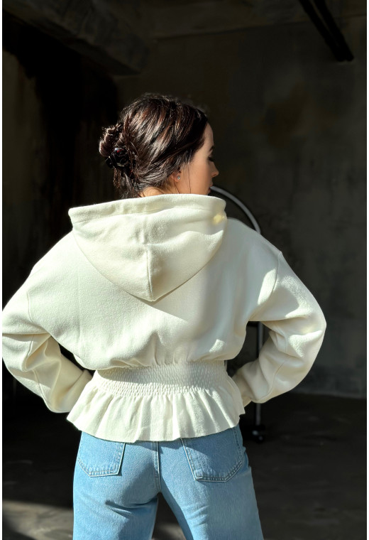 Молочна кофта з баскою — 984900. Maritel. Зображення 1 Молочна кофта з баскою — 984900. Maritel. Зображення 1