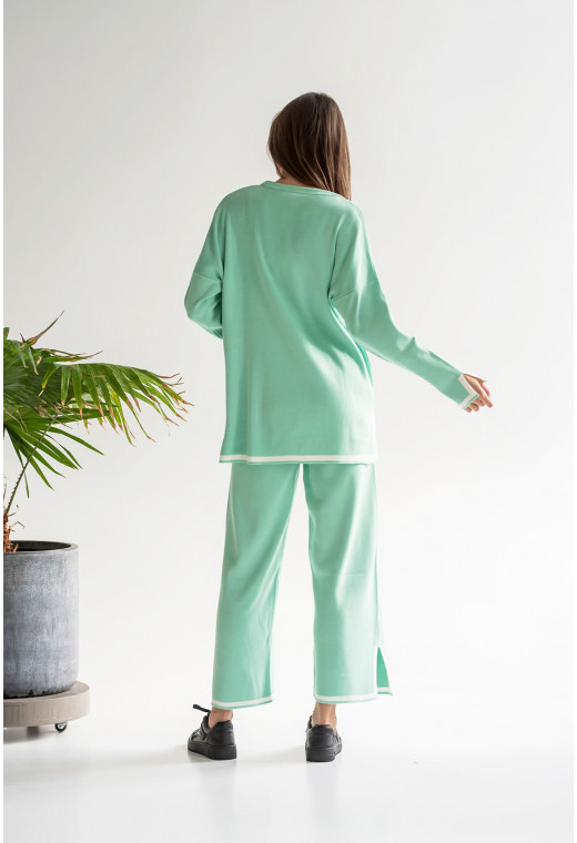 Ментоловый вязаный костюм с окантовкой — 576191. Maritel. Изображенние 2 Ментоловый вязаный костюм с окантовкой — 576191. Maritel. Изображенние 2