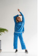 Голубой вязаный костюм с окантовкой — 727294. Maritel Голубой вязаный костюм с окантовкой — 727294. Maritel