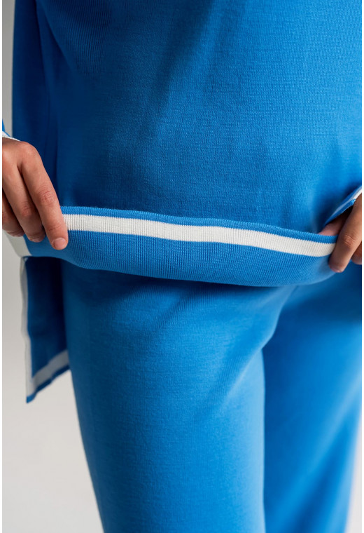 Голубой вязаный костюм с окантовкой — 727294. Maritel. Изображенние 1 Голубой вязаный костюм с окантовкой — 727294. Maritel. Изображенние 1