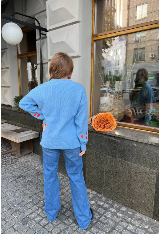 Блакитний пуловер з маками — 851178. Maritel. Зображення 1 Блакитний пуловер з маками — 851178. Maritel. Зображення 1